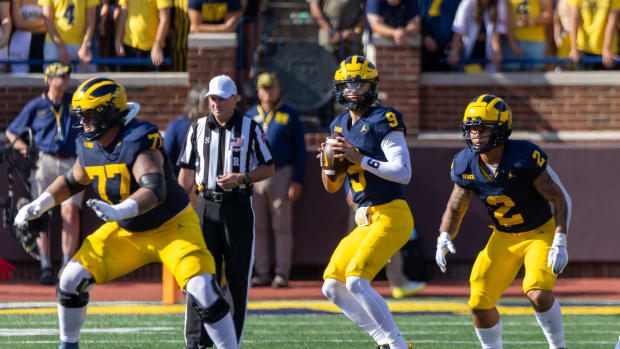 Sep 9, 2023; Ann Arbor, Michigan, USA; Michigan Wolverines quarterback J.J. McCarthy (9) looks down field against the UNLV Rebels during the first half at Michigan Stadium. Mandatory Credit: David Reginek-USA TODAY Sports